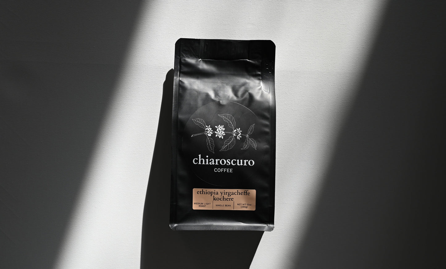 Chiaroscuro Coffee Ethiopia Yirgacheffe Kocher, 12 oz, medium light roast, whole bean packaging.